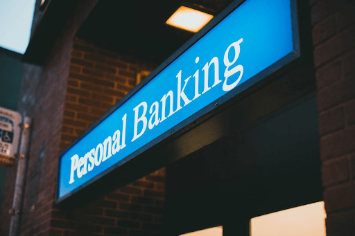A blue logo sign for “Personal Banking”.