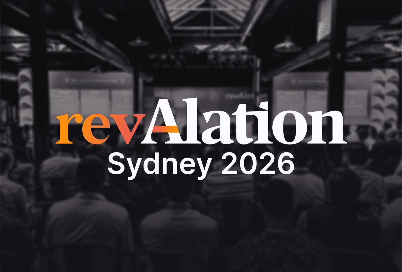 revAlation Sydney 2026 logo over a dark, blurred crowd gathered in a large indoor venue.