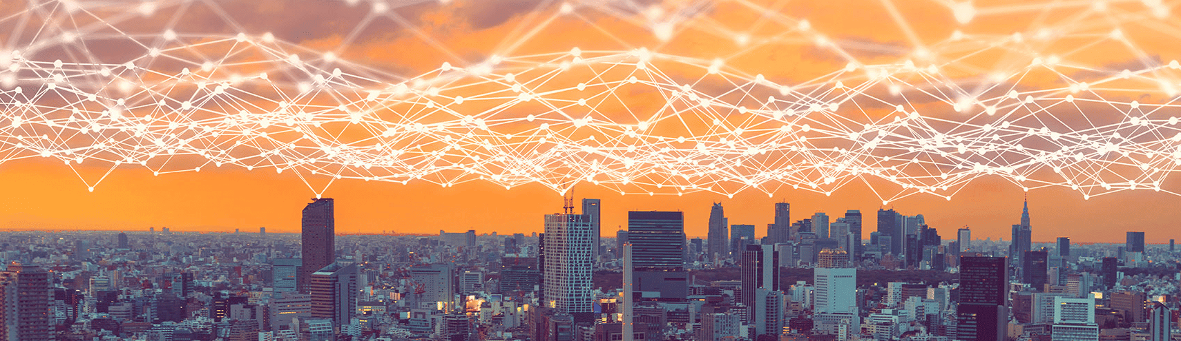 A city landscape with multiple skyscrapers and an orange sky backdrop with interconnected lines all around