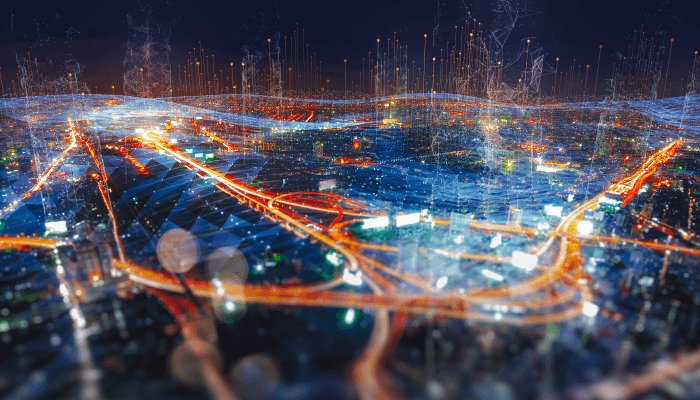 An aerial view of a vibrant cityscape at night, with a illuminated pathway highlighting the journey to mastering data leadership