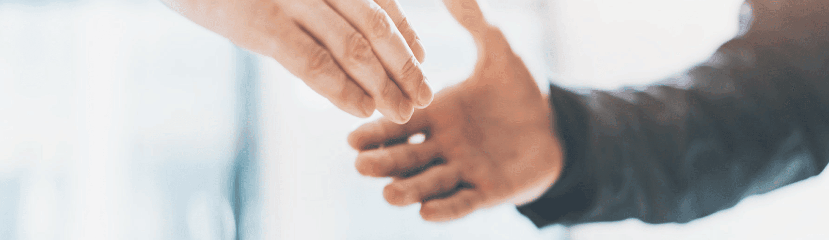 Two hands ready for shaking