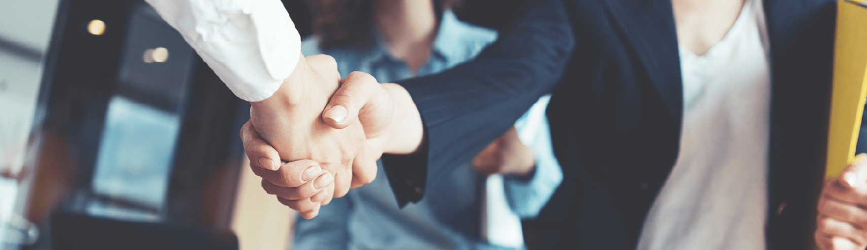A bussiness handshake with the focus on the hands.