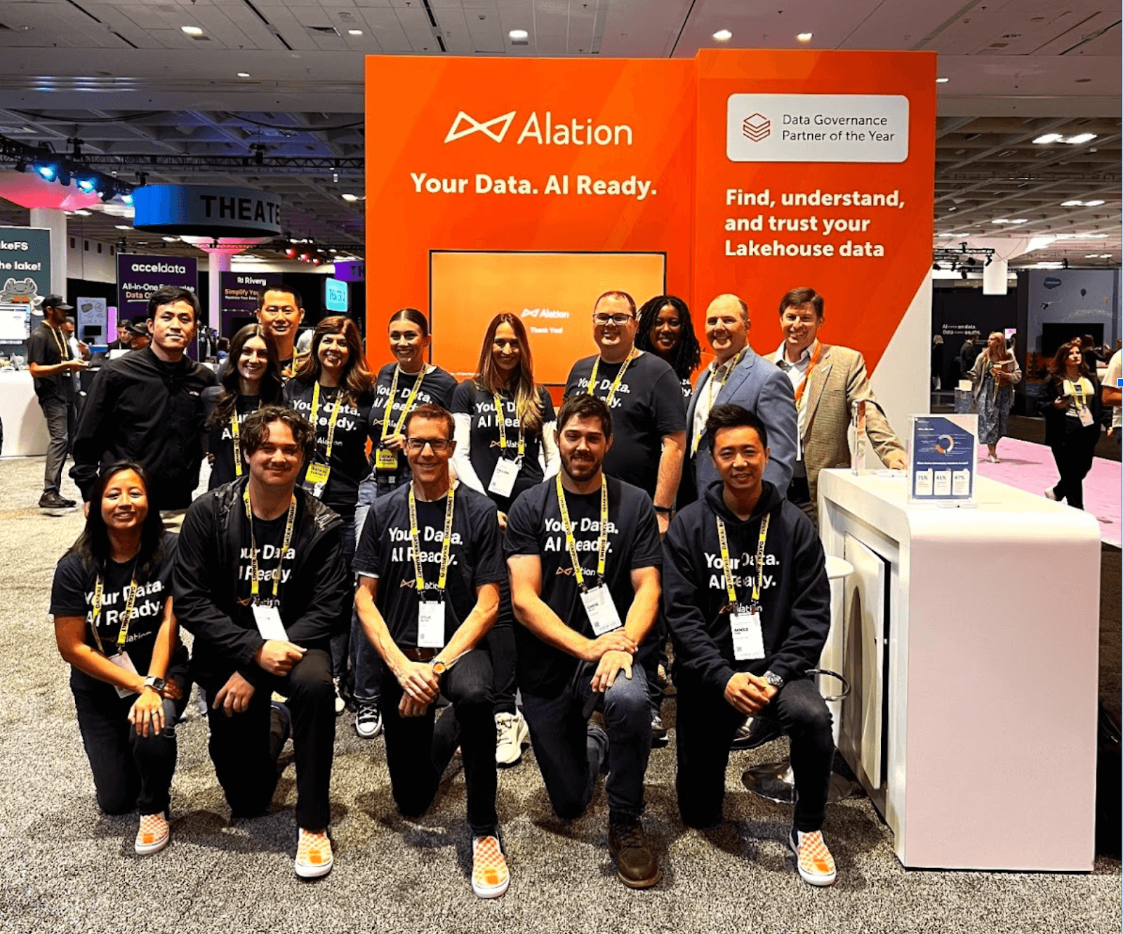 Alation team at the booth at Databricks Summit 2024.
