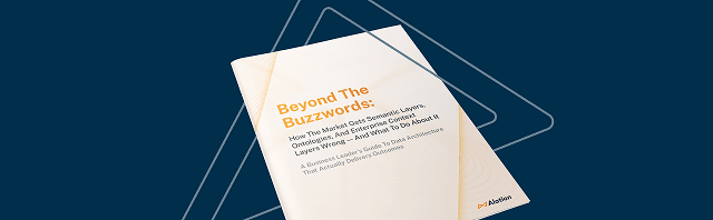 A white booklet titled Beyond The Buzzwords on a dark blue background with geometric triangle outlines.