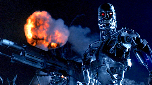 The Terminator with a machine gun, while an explosion is seen in the background