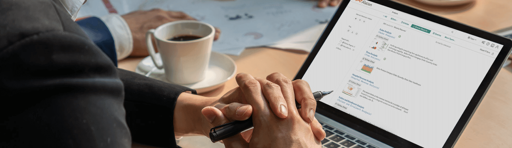 A laptop computer with Alation's Data Catalog displayed on the screen to show how you can accelerate your statewide data strategy in the public sector with Alation